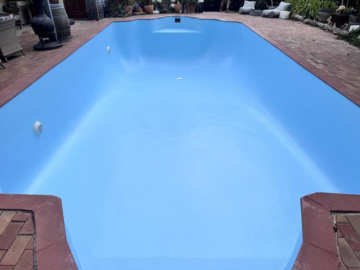 Pool in light blue with new fittings, before filling