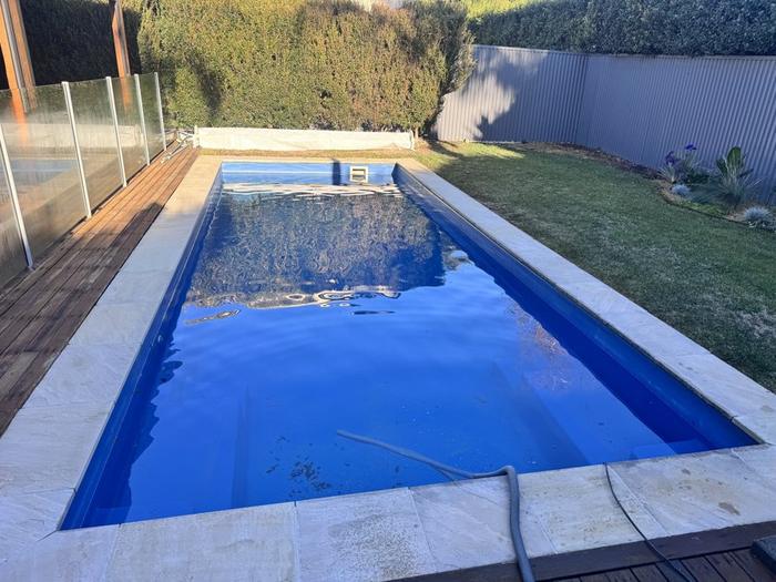 Long pool in deep blue, filling