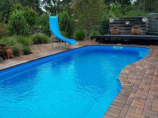 Freeform pool with slide, filled